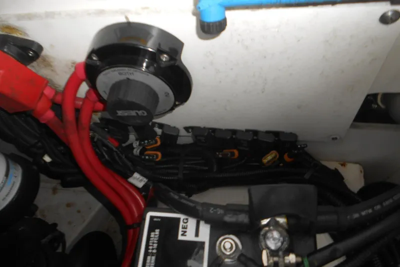 Slide: The Image of Electrical components and wiring inside a 2016 Sea Ray 270 Sundeck boat. - 18
