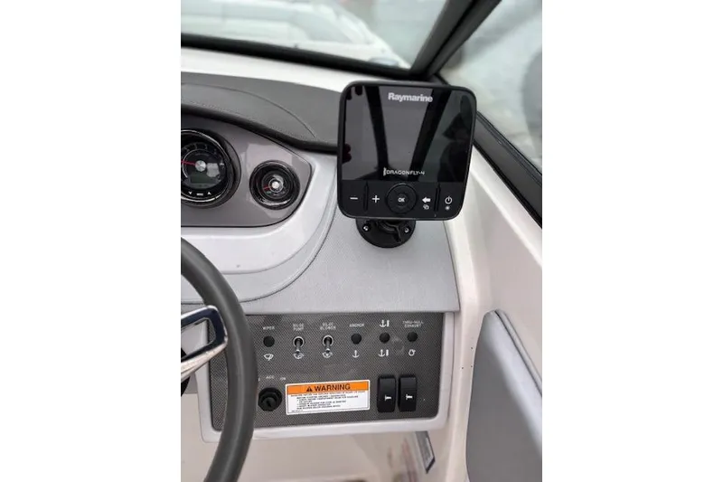 Slide: The Image of Control panel of a 2016 Sea Ray 270 Sundeck with Raymarine Dragonfly display. - 8