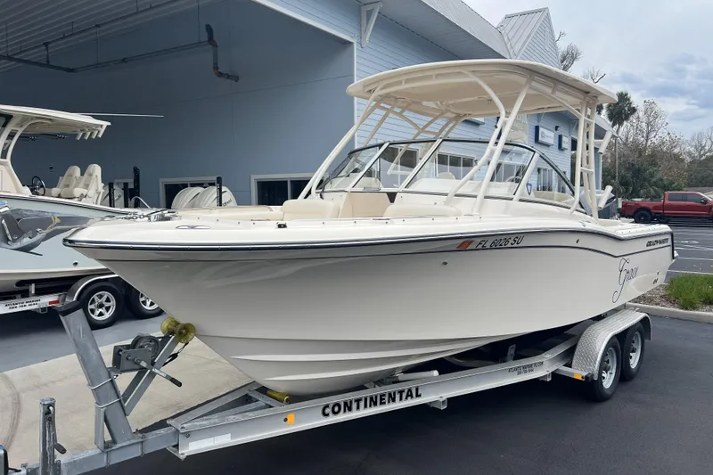 Slide: The Image of 2020 Grady-White Freedom 235 boat interior with plush seating and sleek design. - 13