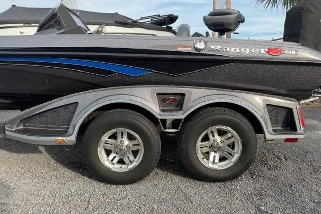 Slide: The Image of 2022 Ranger Z518 Tournament Elite boat trailer with dual wheels, sleek design. - 16