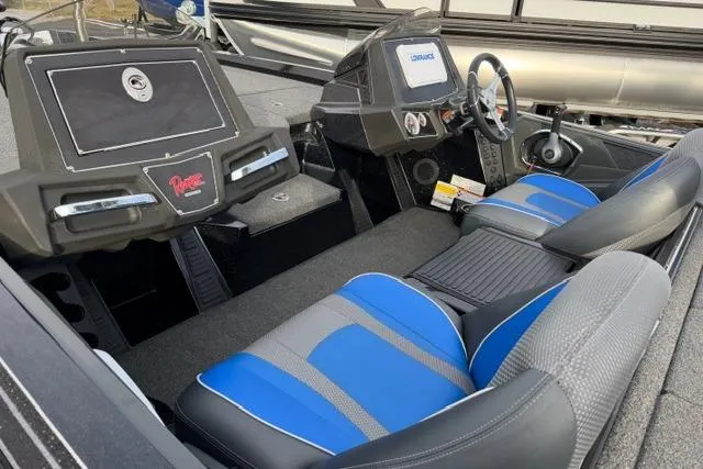 Slide: The Image of 2022 Ranger Z518 Tournament Elite boat interior with blue and gray seating, modern dashboard. - 7