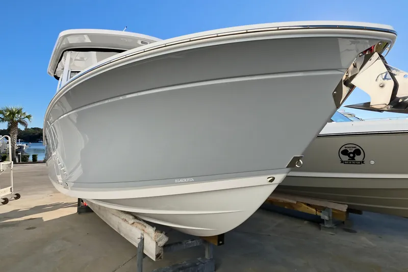 Slide: The Image of 2021 Blackfin 272 DC boat on display, showcasing sleek design and modern features. - 1