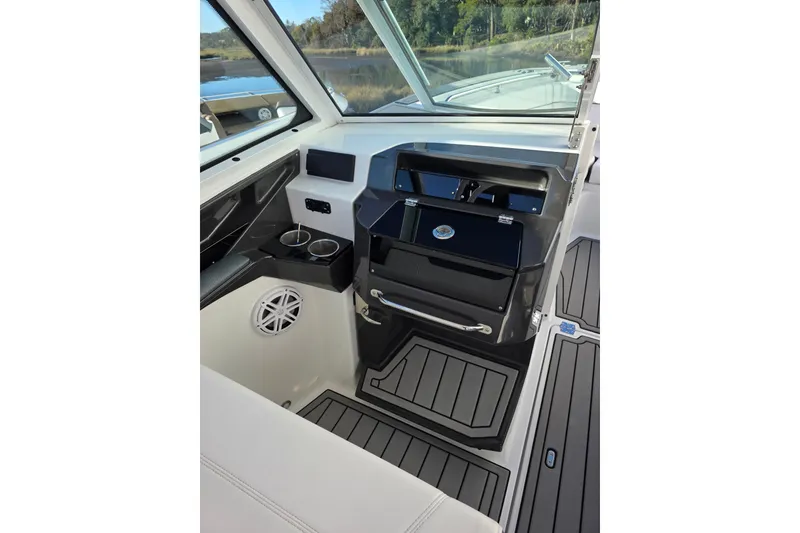 Slide: The Image of Interior of 2021 Blackfin 272 DC boat, featuring sleek design and modern amenities. - 10