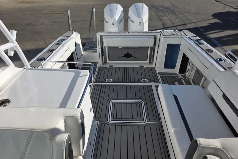 Slide: The Image of 2021 Blackfin 272 DC boat interior with sleek seating and modern design. - 6