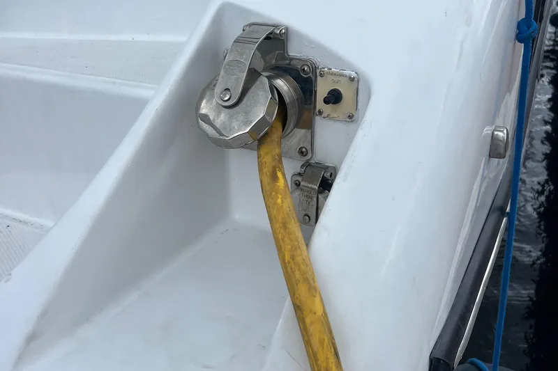 Slide: The Image of Fuel hose connection on 1998 Hyatt 51 Aft Cabin Motor Yacht. - 12
