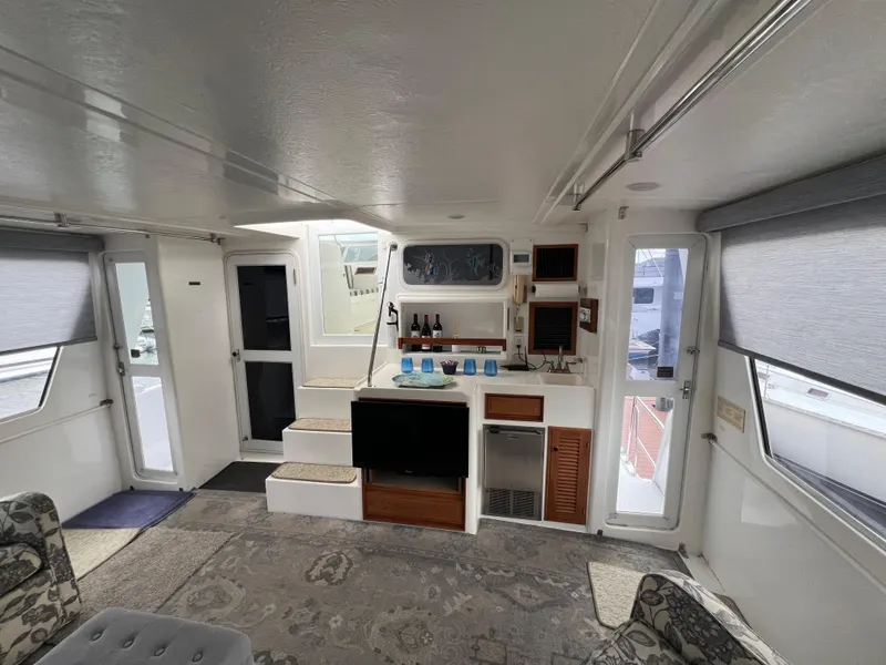 Slide: The Image of Interior of 1998 Hyatt 51 Aft Cabin Motor Yacht, featuring modern amenities and stylish decor. - 29