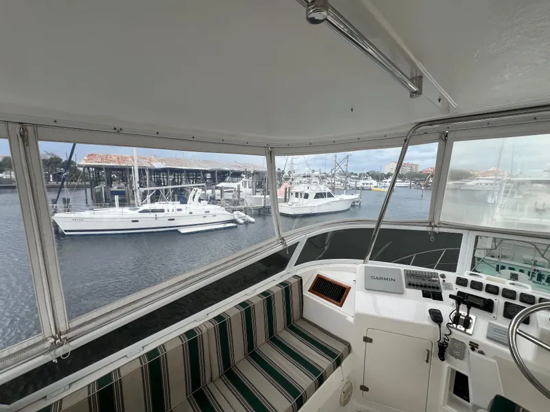 Slide: The Image of 1998 Hyatt 51 Aft Cabin Motor Yacht interior with marina view. - 41