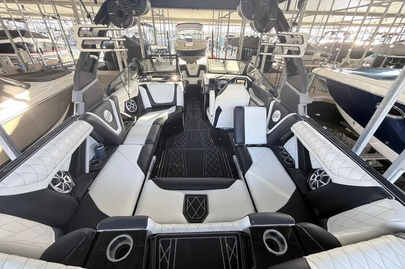 Slide: The Image of Luxurious interior of 2021 Tigé 23ZX boat with stylish seating and modern design. - 18