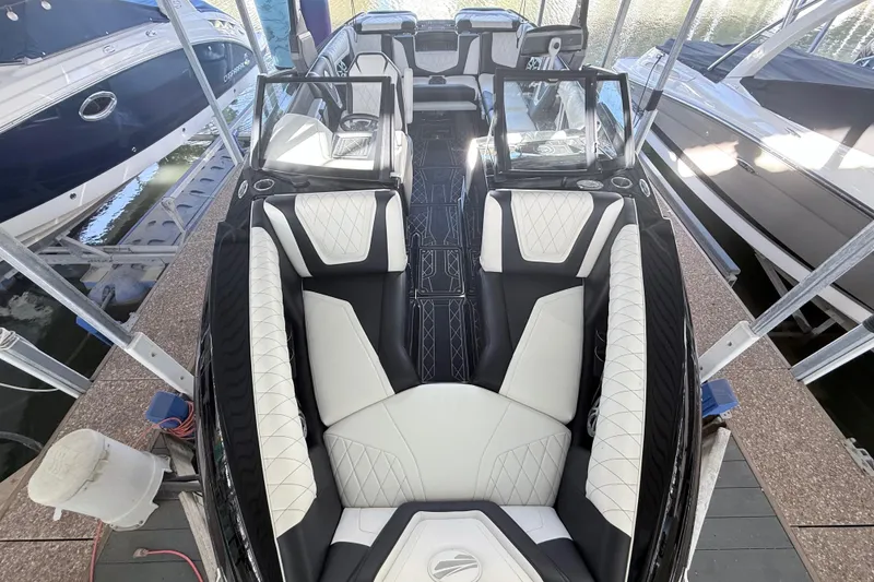 Slide: The Image of 2021 Tigé 23ZX boat interior with luxurious seating and modern design. - 20
