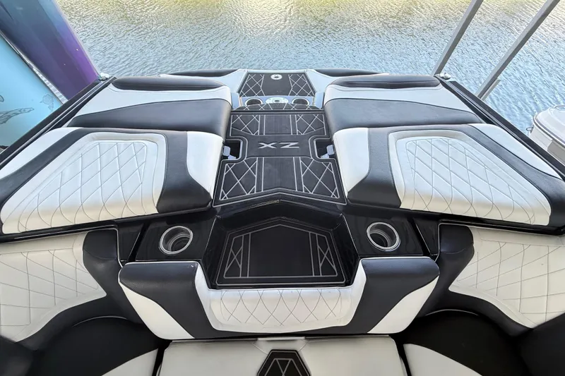 Slide: The Image of Interior view of 2021 Tigé 23ZX boat with luxury seating and advanced audio system. - 26