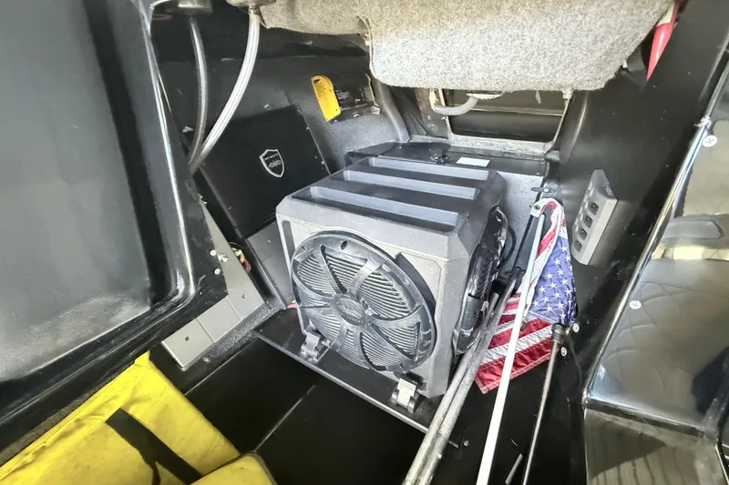 Slide: The Image of 2021 Tigé 23ZX boat dashboard display showing speed, RPM, and temperature controls. - 30