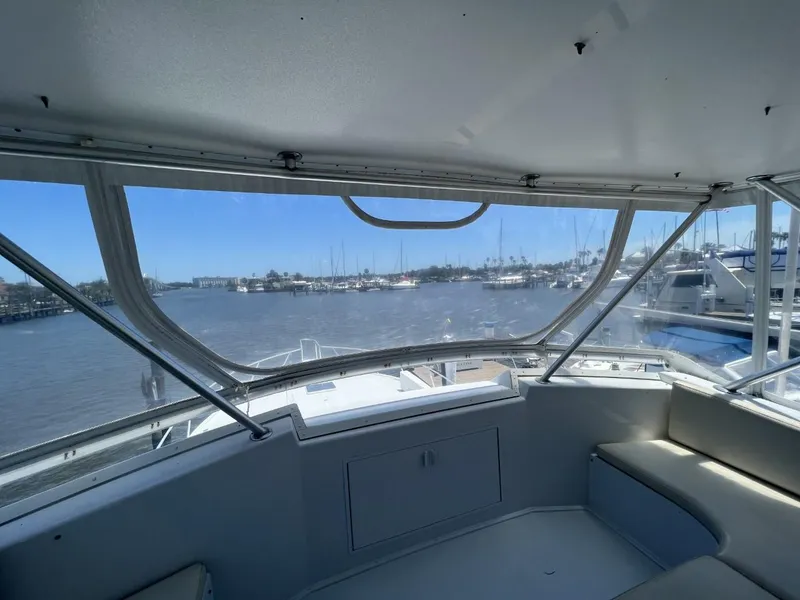 Slide: The Image of Interior view of a 1991 Viking Convertible yacht in harbor. - 16