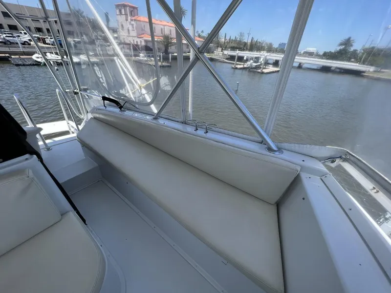 Slide: The Image of Interior of a 1991 Viking Convertible yacht at the marina. - 17
