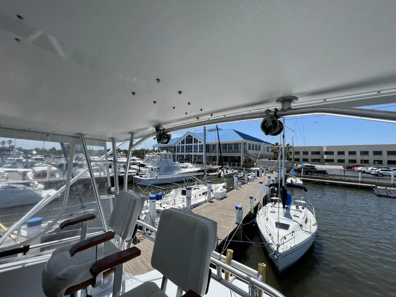 Slide: The Image of View from a 1991 Viking Convertible overlooking a marina. - 21