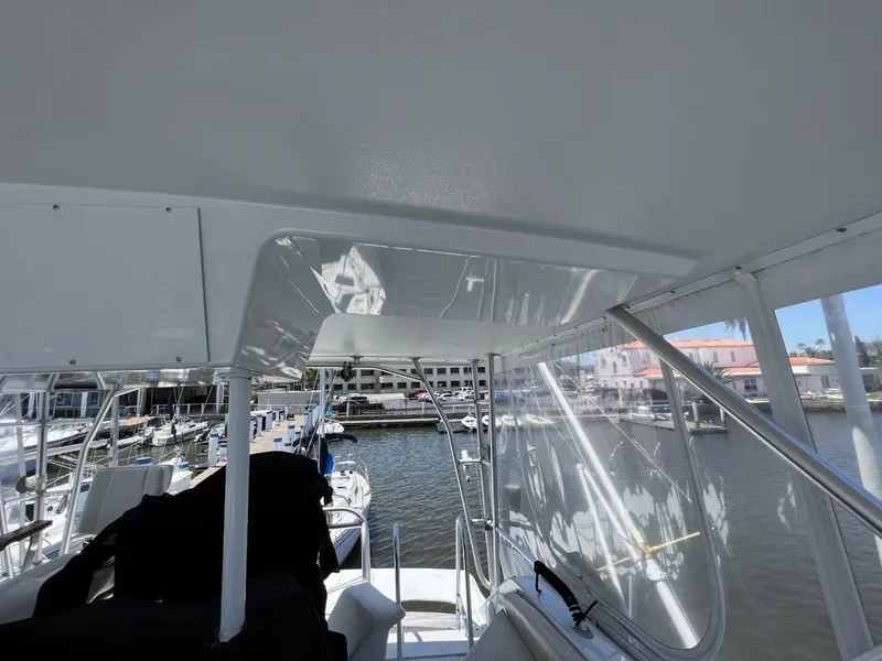 Slide: The Image of Interior view of a 1991 Viking Convertible boat in the harbor. - 22