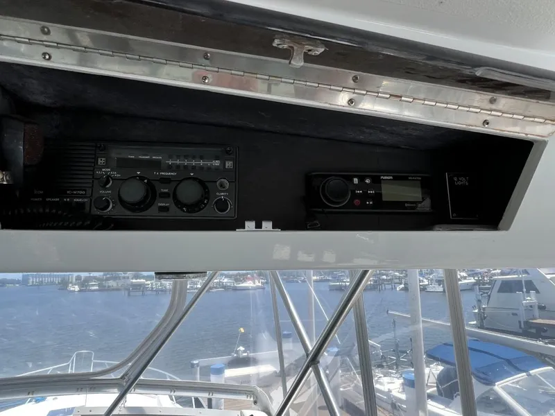 Slide: The Image of Interior view of a 1991 Viking Convertible boat with controls. - 26