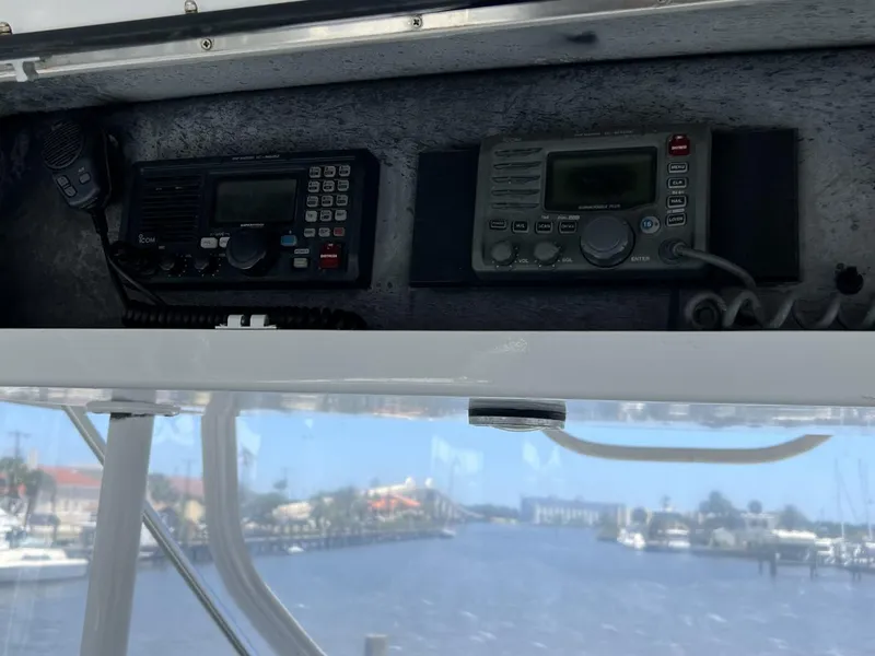 Slide: The Image of Radios inside a 1991 Viking Convertible boat. - 27