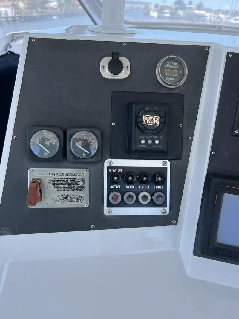 Slide: The Image of Dashboard of a 1991 Viking Convertible boat. - 32