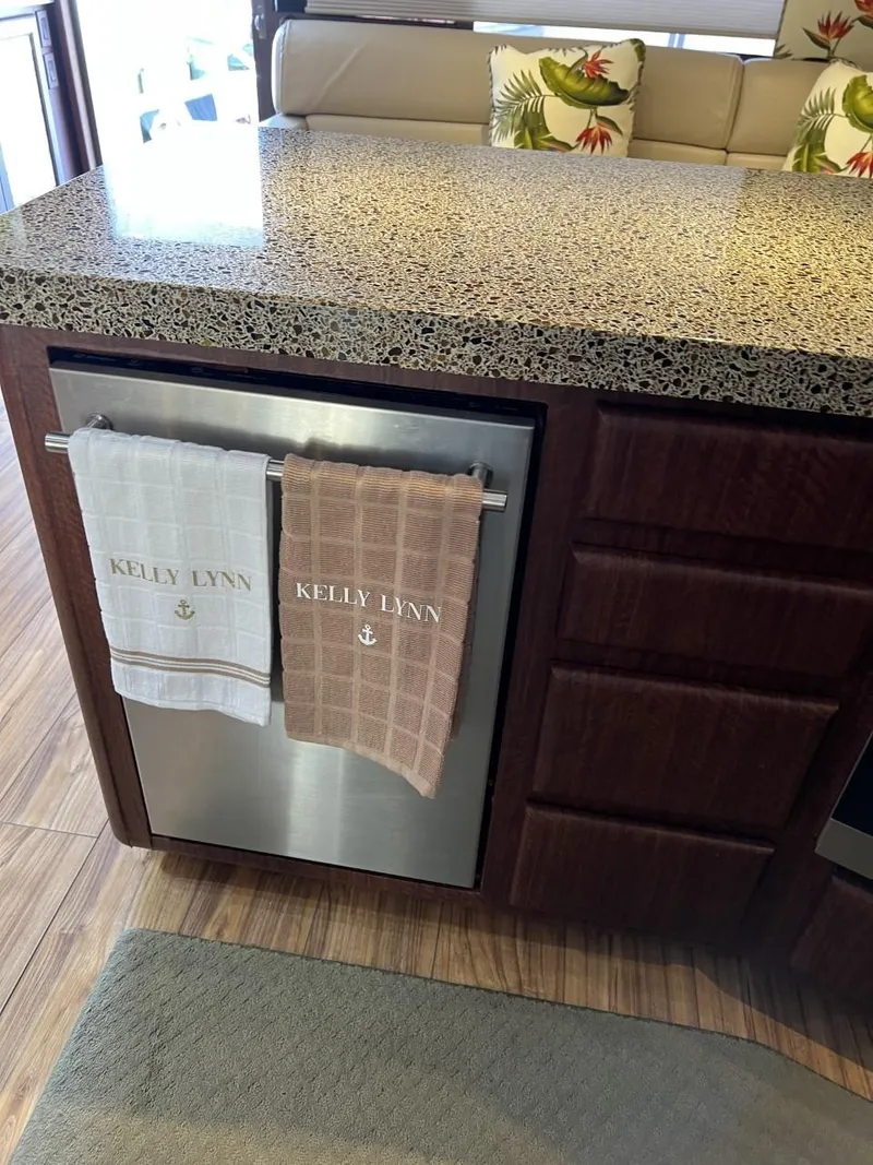 Slide: The Image of 1991 Viking Convertible kitchen with granite countertop and personalized towels. - 47