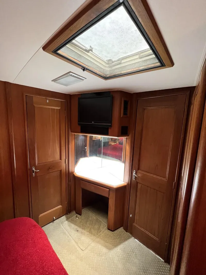 Slide: The Image of Interior of a 1991 Viking Convertible with wood paneling and skylight. - 66