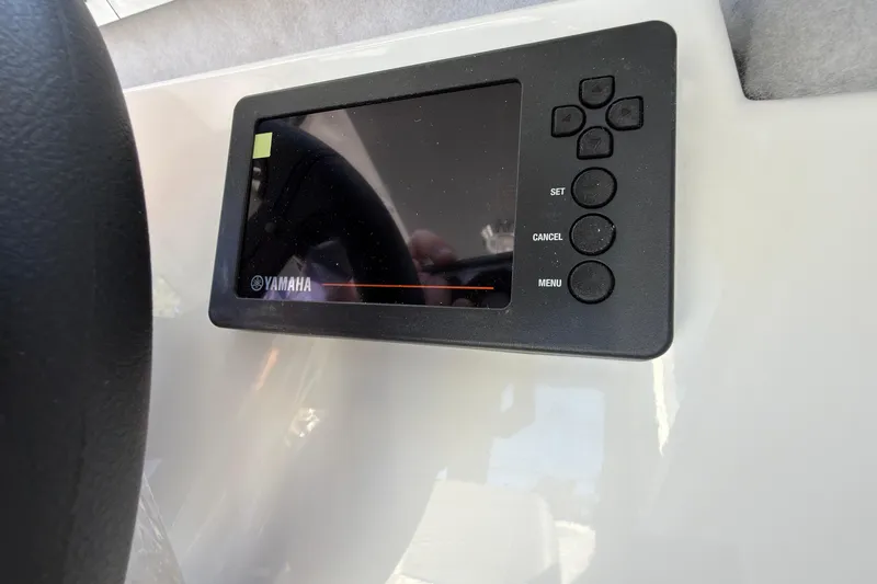 Slide: The Image of Yamaha control panel on 2026 Defiance Admiral 220 EX boat dashboard. - 25