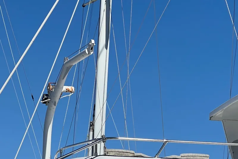 Slide: The Image of Mast and rigging of 1986 Gulfstar 44 Aft Cabin sailboat against clear blue sky. - 19