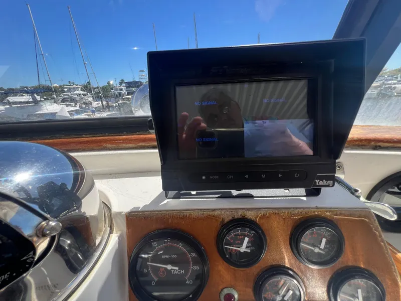 Slide: The Image of Control panel of 1986 Gulfstar 44 Aft Cabin with gauges and navigation screen. - 37
