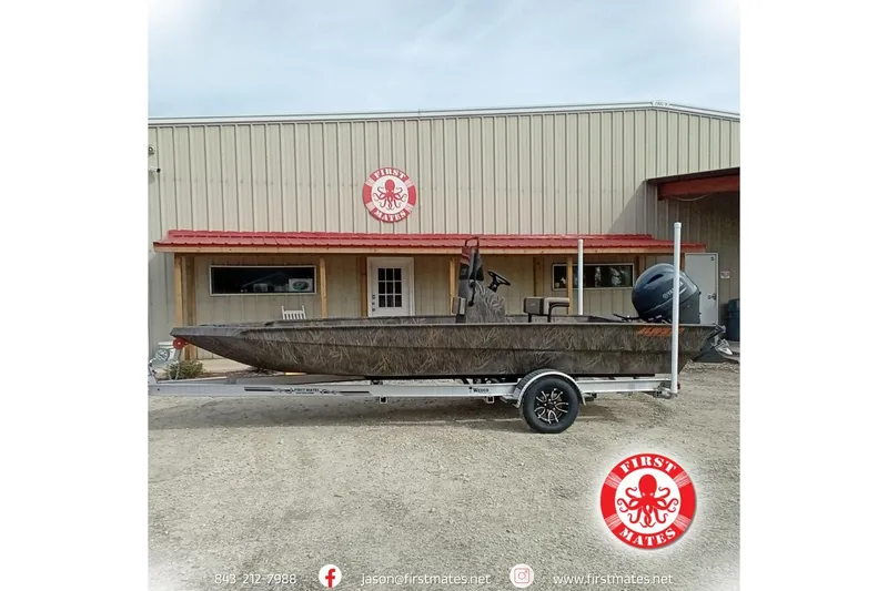 The Image of 2026 Alweld 2070 Vortex boat on trailer outside First Mates building. - 1