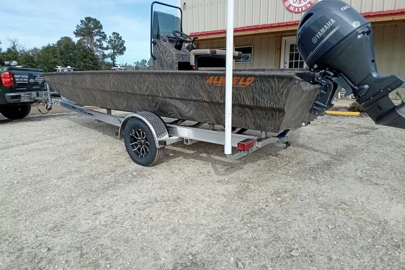 Slide: The Image of 2026 Alweld 2070 Vortex boat on trailer with Yamaha outboard motor. - 10