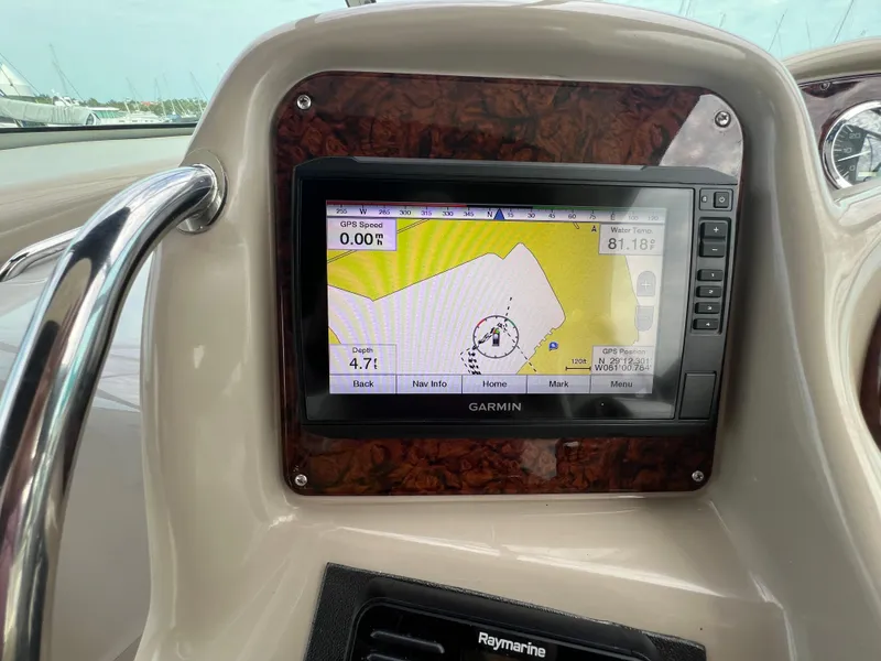Slide: The Image of Garmin GPS display on 2003 Sea Ray 320 Sundancer boat dashboard. - 23