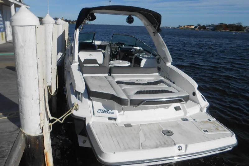 The Image of 2019 Monterey 298SS Super Sport boat docked by the water. - 0