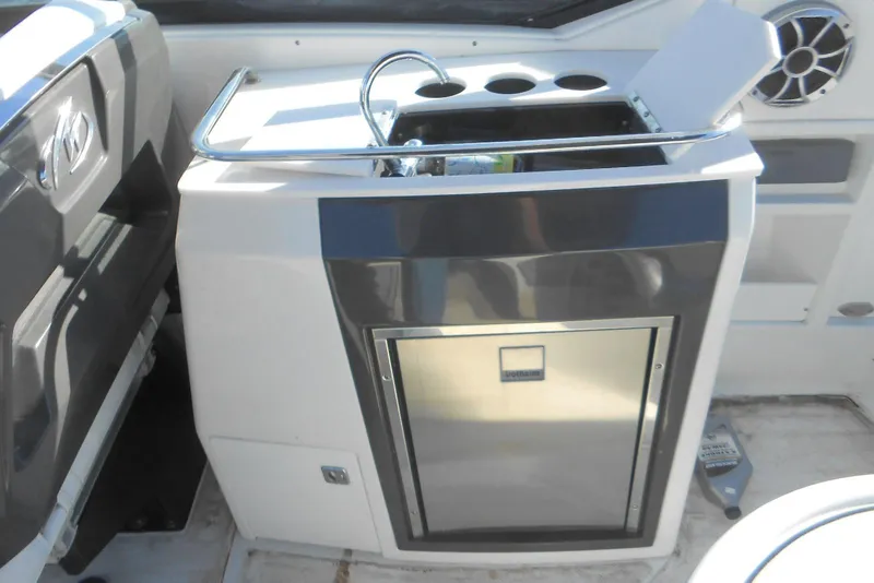 Slide: The Image of 2019 Monterey 298SS Super Sport boat interior with sink and storage area. - 10