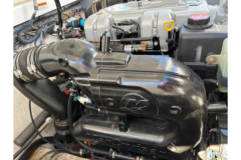 Slide: The Image of Engine of a 2019 Monterey 298SS Super Sport boat, featuring MerCruiser components. - 19