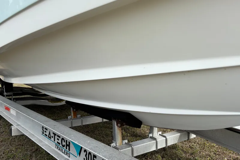 Slide: The Image of 2022 Century 2600 Center Console boat on Sea-Tech trailer, side view. - 10