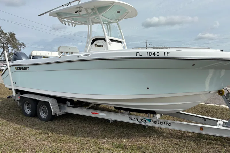 Slide: The Image of 2022 Century 2600 Center Console boat on trailer, side view. - 3