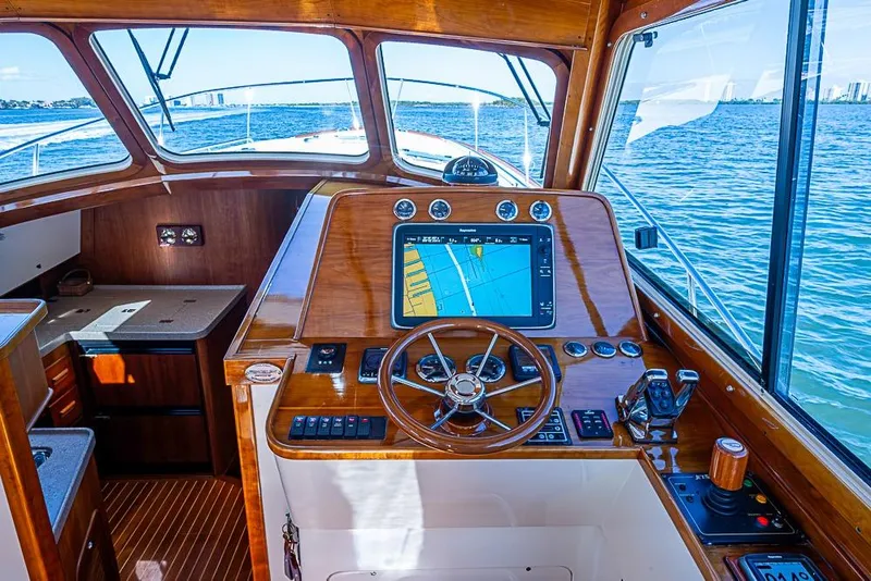 Slide: The Image of 2008 Hinckley Talaria 44 MY yacht helm with navigation system and ocean view. - 14