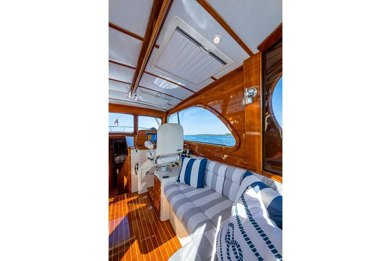 Slide: The Image of Luxurious interior of 2008 Hinckley Talaria 44 MY yacht with elegant wood finish. - 17