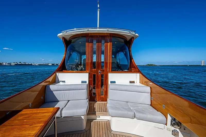 Slide: The Image of Hinckley Talaria 44 MY 2008 yacht with elegant seating, cruising on a sunny day. - 7