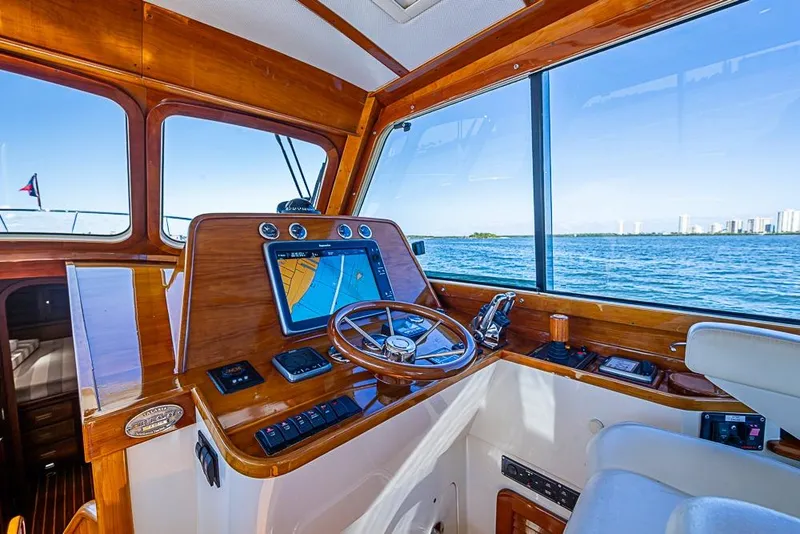 Slide: The Image of Helm of 2008 Hinckley Talaria 44 MY yacht with navigation system and ocean view. - 12
