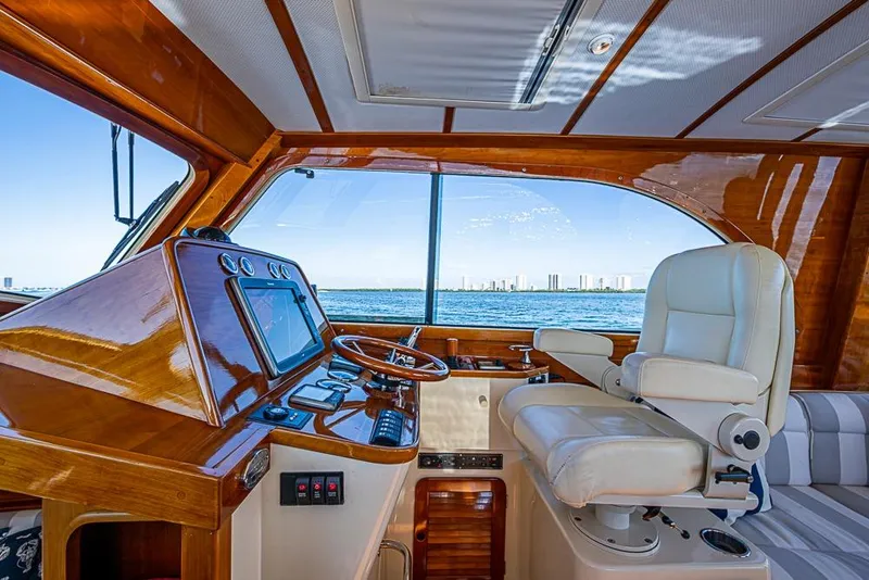 Slide: The Image of Luxurious 2008 Hinckley Talaria 44 MY yacht interior with elegant helm and captain's chair. - 13