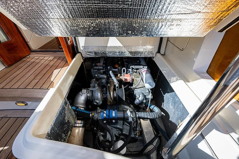 Slide: The Image of Engine compartment of 2008 Hinckley Talaria 44 MY yacht, showcasing mechanical components. - 28