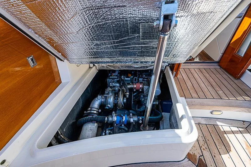 Slide: The Image of Engine compartment of 2008 Hinckley Talaria 44 MY yacht, showcasing mechanical components. - 29
