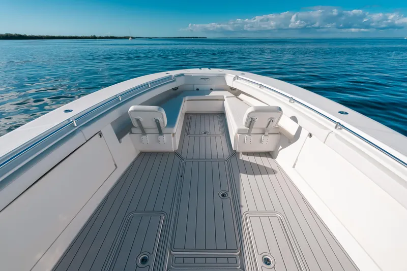 Slide: The Image of 2016 Invincible 42 Open Fisherman boat on calm ocean waters. - 25