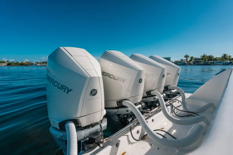 Slide: The Image of Four Mercury outboard engines on a 2016 Invincible 42 Open Fisherman boat. - 40