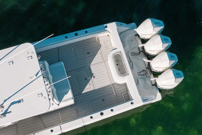 Slide: The Image of Overhead view of 2016 Invincible 42 Open Fisherman boat with four outboard engines. - 9