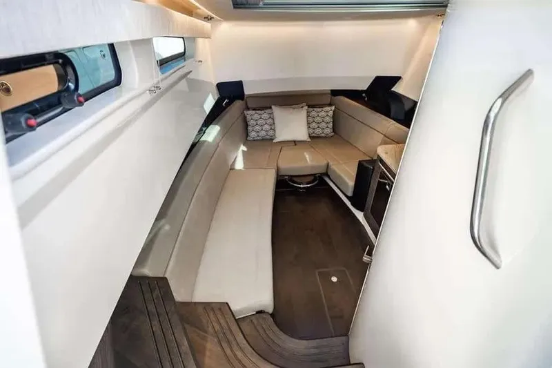 Slide: The Image of Luxurious interior of 2022 Boston Whaler 420 Outrage with elegant seating and modern design. - 13
