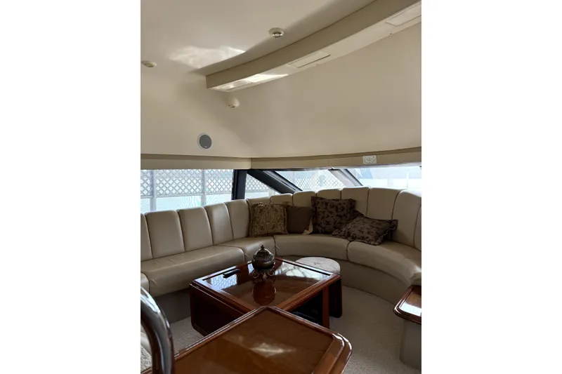 Slide: The Image of Luxurious interior of 2005 Carver 570 Voyager Pilothouse yacht with elegant furnishings. - 4
