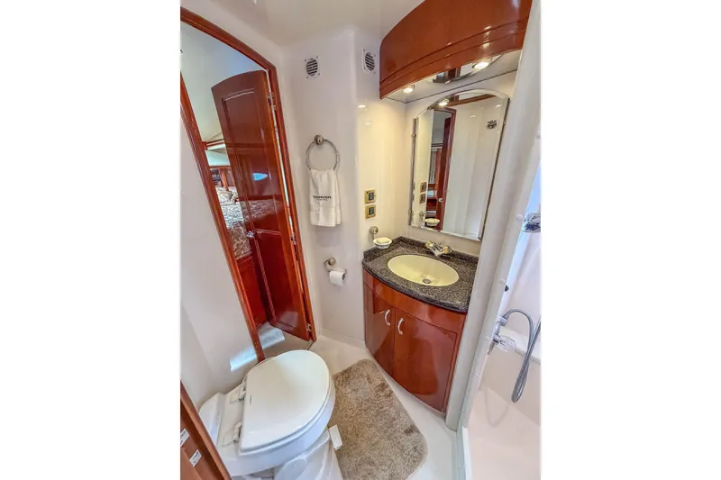 Slide: The Image of Luxurious bathroom in 2005 Carver 570 Voyager Pilothouse yacht with elegant fixtures. - 40