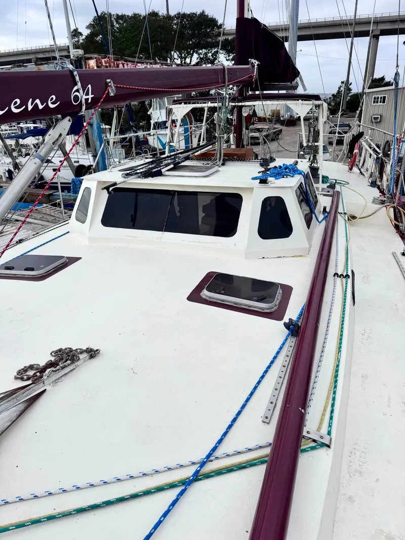 Slide: The Image of Bruce Roberts 64 Custom Steel Cruiser, 1999 model, docked at marina. - 14