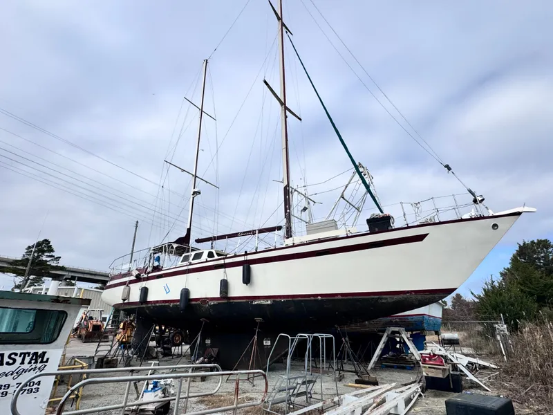 Slide: The Image of 1999 Bruce Roberts 64 Custom Steel Cruiser in dry dock. - 2